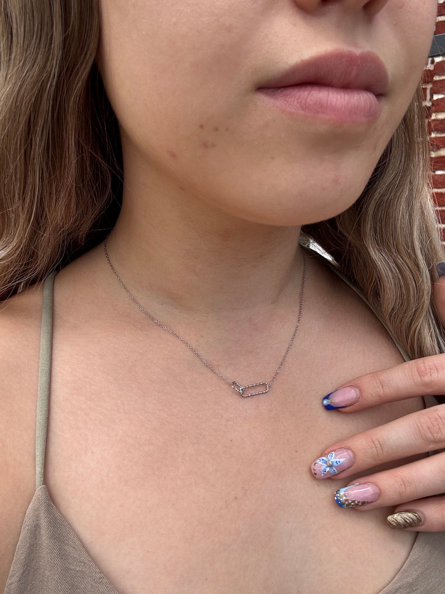 Collier avec pandentif rectangle en acier inoxydable